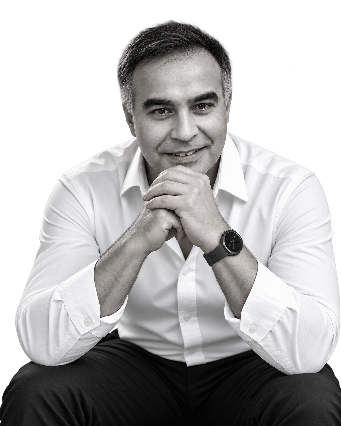 Black-and-white portrait of Pedro Estoura wearing a white shirt, leaning forward with hands clasped